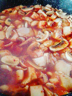 Una foto de Menudo de setas y hongos
