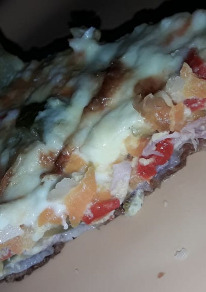 Una foto de Tarta de zapallitos, jamón y queso😋