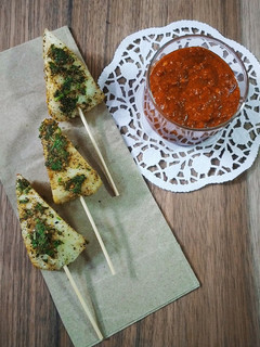 A picture of Rava Idli Satay with Peanut Sauce.