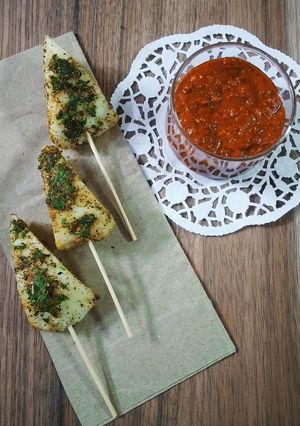 A picture of Rava Idli Satay with Peanut Sauce.