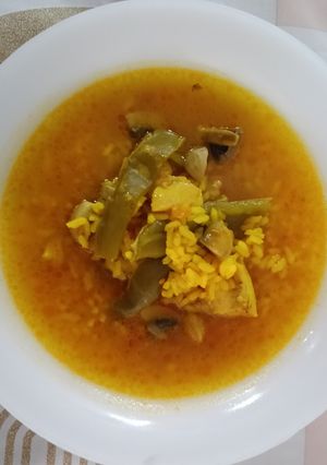 Una foto de Arroz Caldoso con Pollo y Champiñones