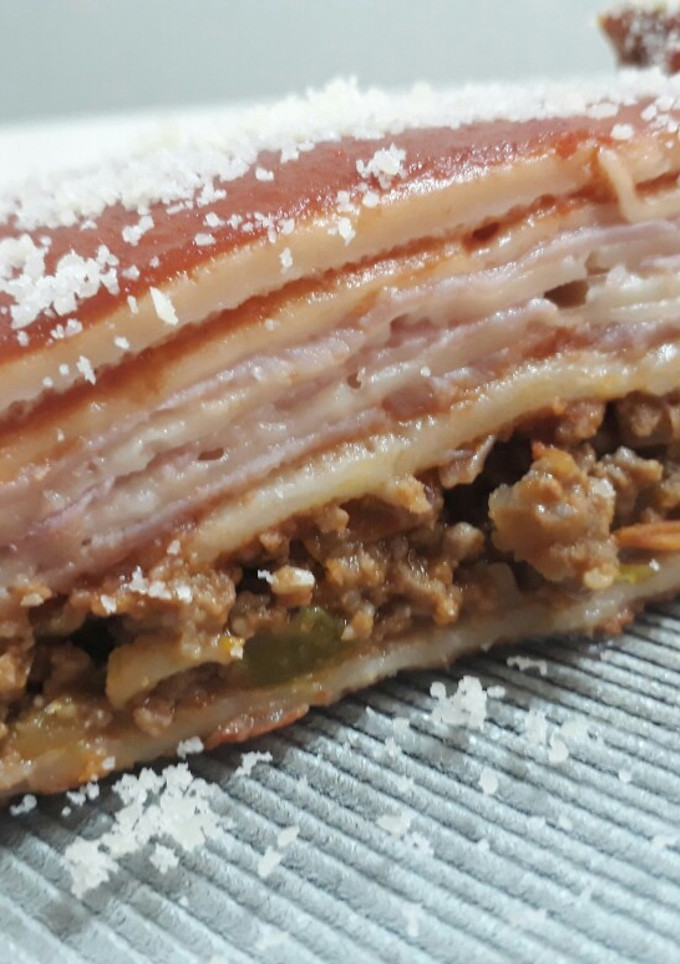 Una foto de Lasaña con masa de panqueques y salsa fileto