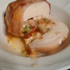 A picture of Cheesy broccoli and asparagus chicken breast.