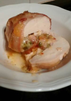 A picture of Cheesy broccoli and asparagus chicken breast.