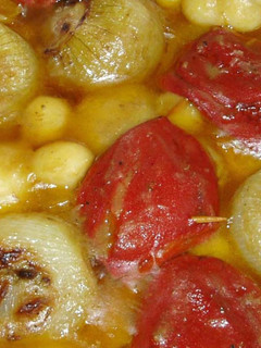 Una foto de Patatas, pimientos y cebollas rellenas