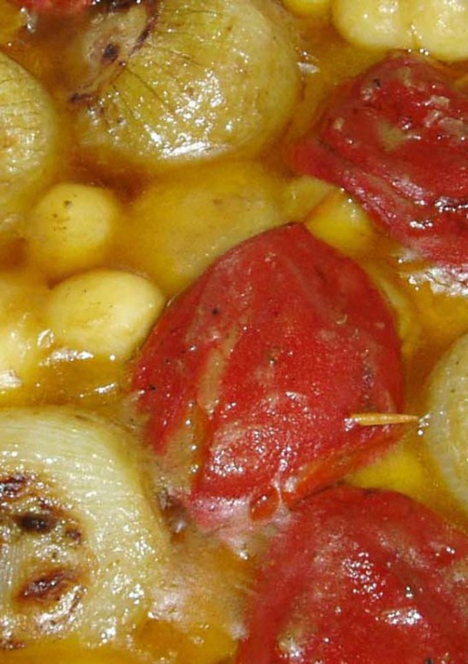 Una foto de Patatas, pimientos y cebollas rellenas