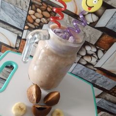 A picture of Spodila - banana milkshake with blueberry ice-cream twist🍌🍨🥤.
