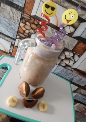 A picture of Spodila - banana milkshake with blueberry ice-cream twist🍌🍨🥤.