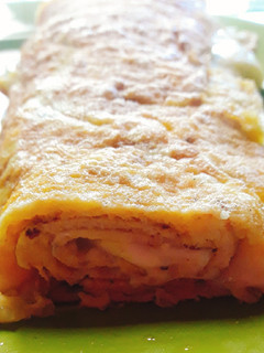 Una foto de Omelette arrollado