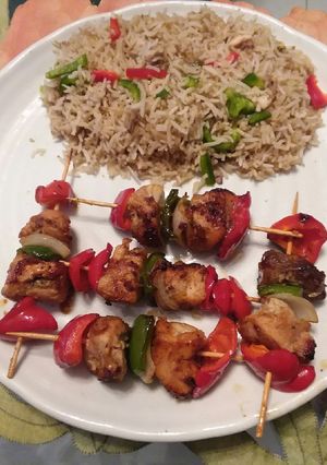 A picture of Shaslik stick with fried rice.