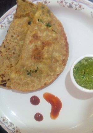 A picture of Paneer cheese parantha with teel chatany.