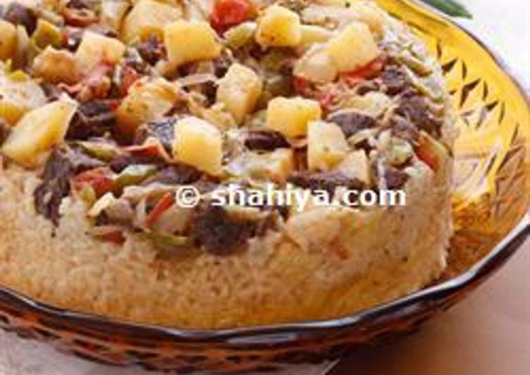 Mechwi Jader- Upside down rice and vegetable cake