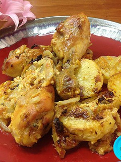 Una foto de Muslos de pollo al horno con all-i-oli