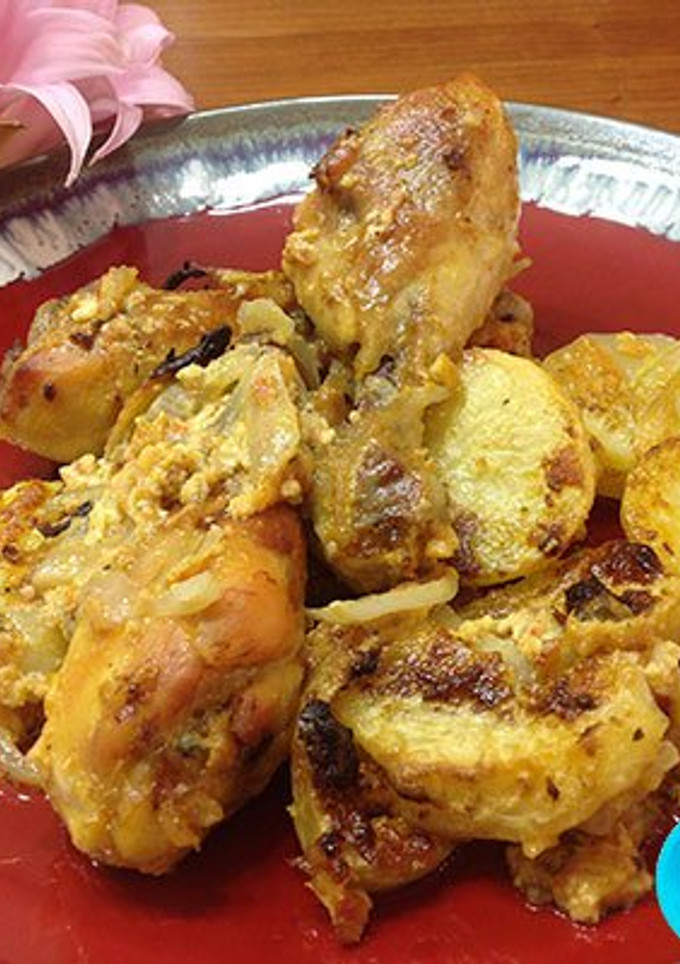 Una foto de Muslos de pollo al horno con all-i-oli