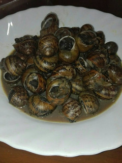 Una foto de Caracoles en salsa picante en la olla GM