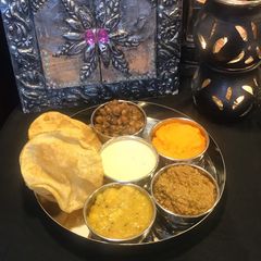 A picture of Halwa poori thaaliPart 1.