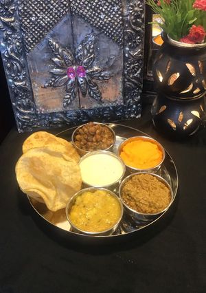 A picture of Halwa poori thaaliPart 1.