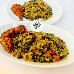 A picture of Dambun shinkafa with peppered fish....