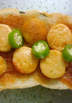 A picture of Sausage Grilled Cheese Sandwich with Sriracha.