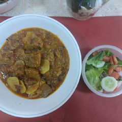 A picture of Mutton potato onion masala.