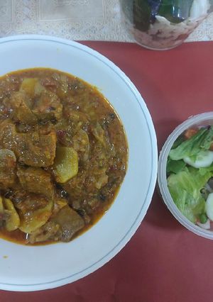 A picture of Mutton potato onion masala.