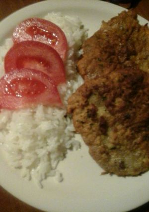 Una foto de Milanesas de carne picada con cebollas