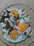 Huevos fritos a la provenzal y muzza repicantes