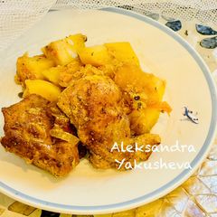 A picture of Chicken with pineapple and potatoes in a baking sleeve.