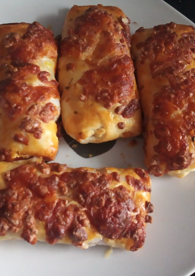 Una foto de Napolitanas de jamón York y queso en freidora