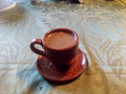 Una foto de cómo preparar chocolate con leche atole