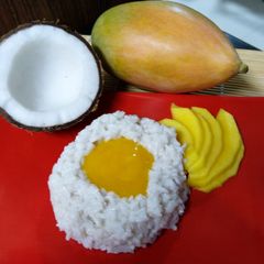 A picture of Sticky Coconut Rice With Mango.