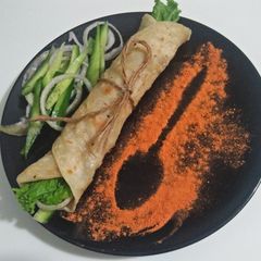 A picture of Smokey roll paratha.