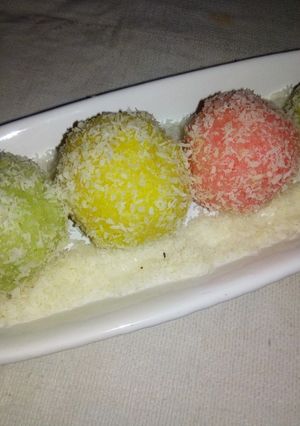 A picture of Colourful Coconut laddu.