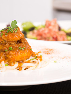 Una foto de Noodles con gambas al curry