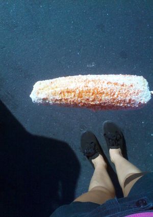 A picture of Mexican corn on the cob.