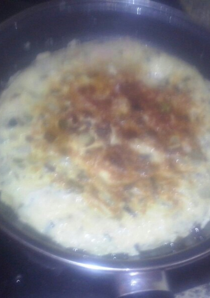 Una foto de Tortilla de calabacín y pimientos