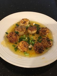 A picture of Pan Seared Scalloos with Brown Butter Sauce.