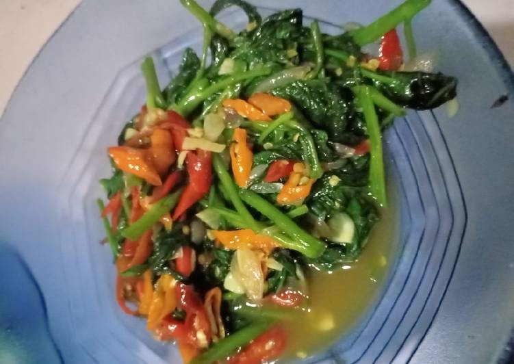 Tumis kangkung bumbu racik indofood