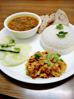 A picture of Healthy dal palak, cabbage sabji,roti,rice and salad.