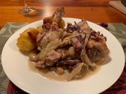 A picture of chicken and lima beans