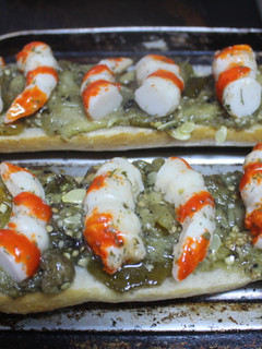 Una foto de Panini de colas de langostinos de surimi