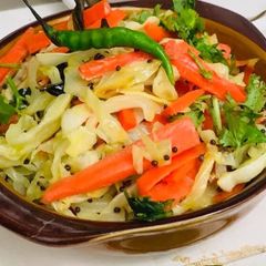 A picture of Cabbage carrot sambharo warm salad.
