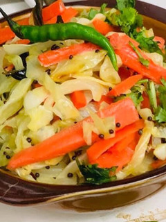 A picture of Cabbage carrot sambharo warm salad.