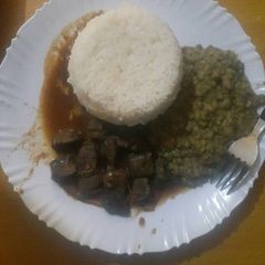 Maini with rice and ndengu A picture of Maini with rice and ndengu.