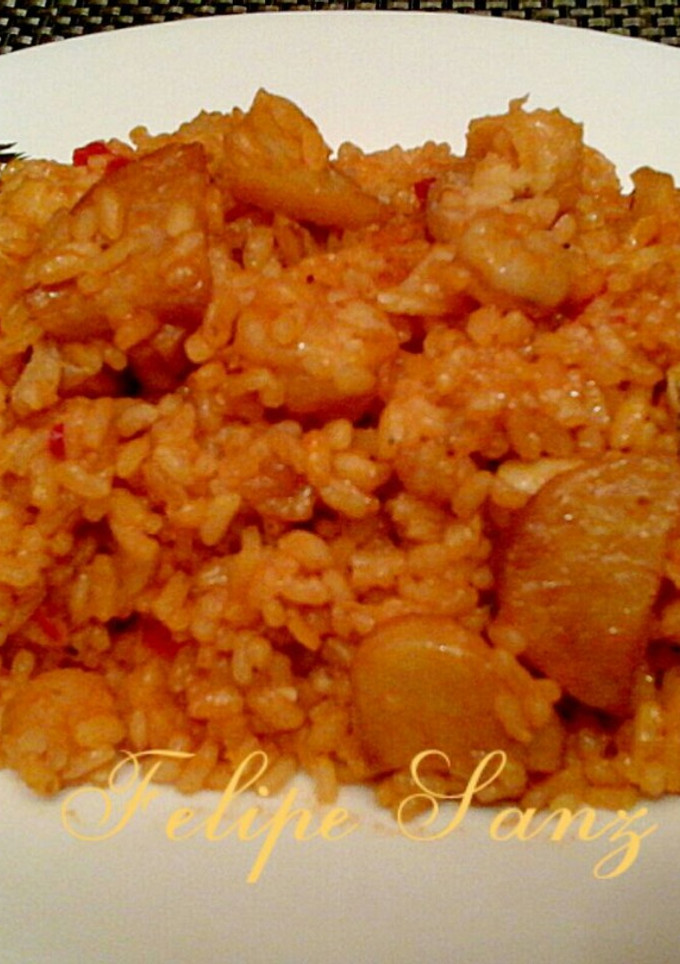 Una foto de Arroz con bacalao y gambas