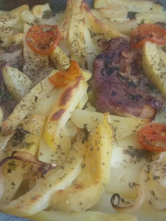 Una foto de Asado de filetes de magra y patatas