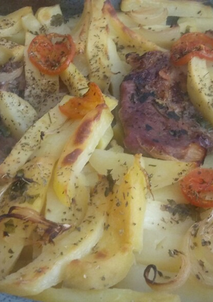 Una foto de Asado de filetes de magra y patatas