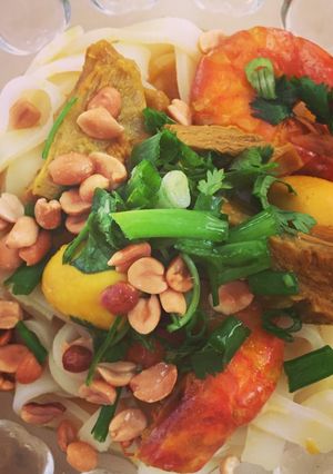 A picture of Quang-Style Noodles with Shrimp, Pork Ribs, and Quail Eggs.