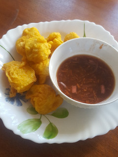 A picture of Viazi Karai/hot & sweet tamarind sauce.