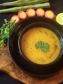 A picture of Carrot Drumstick Soup.